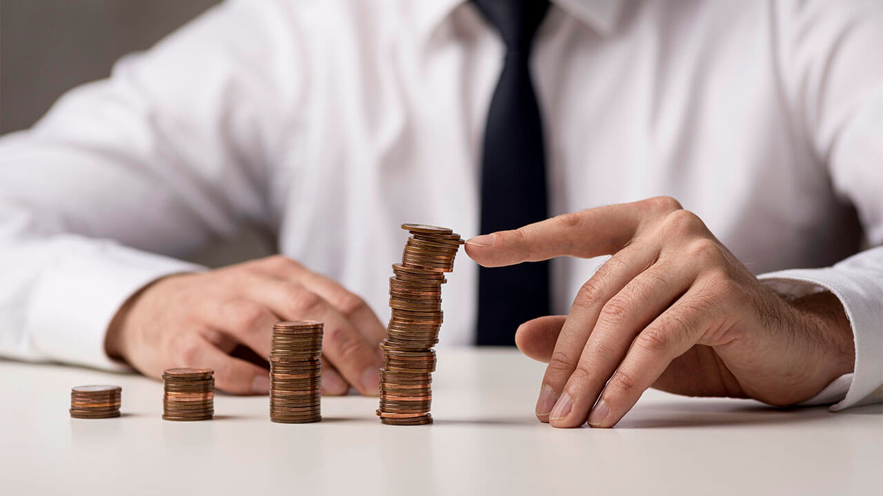 Coins on a table making an upward graph